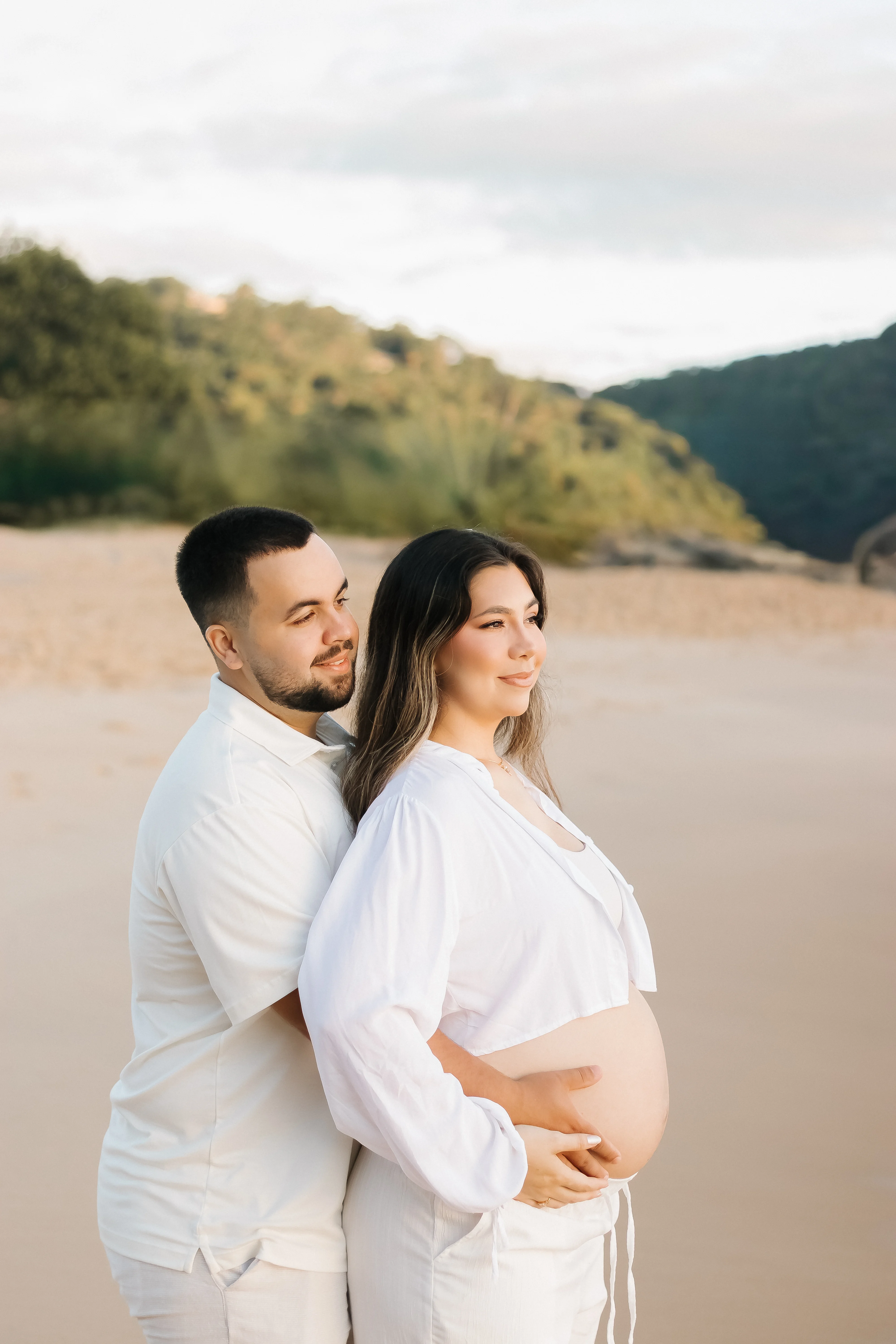Casal gestante na praia
